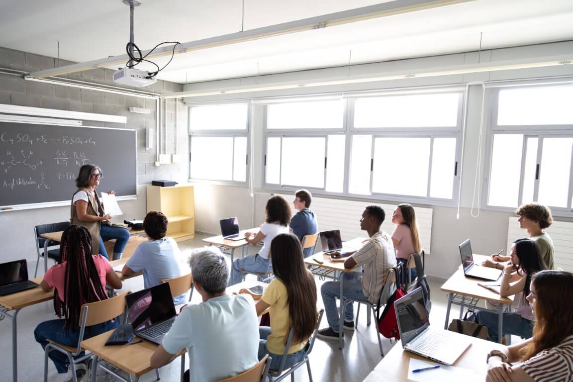 classroom with engaged students and teacher