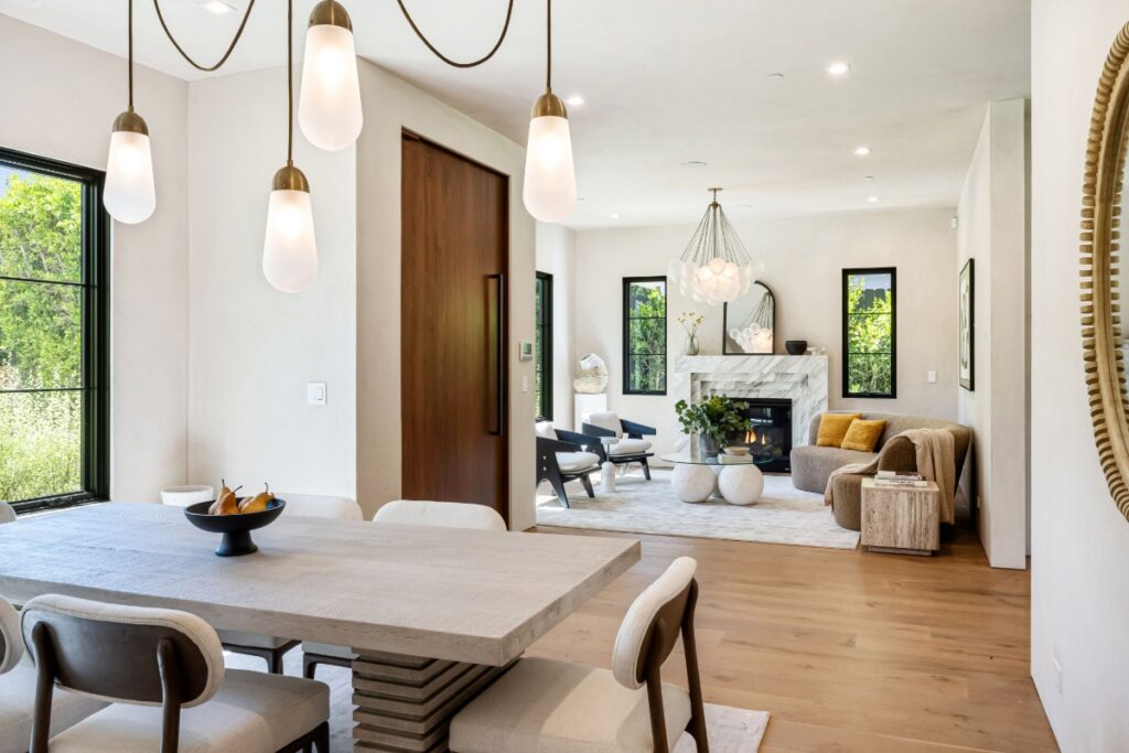 open floor plan living room with modern lighting